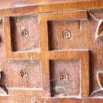 Swastika on the door of a jain temple